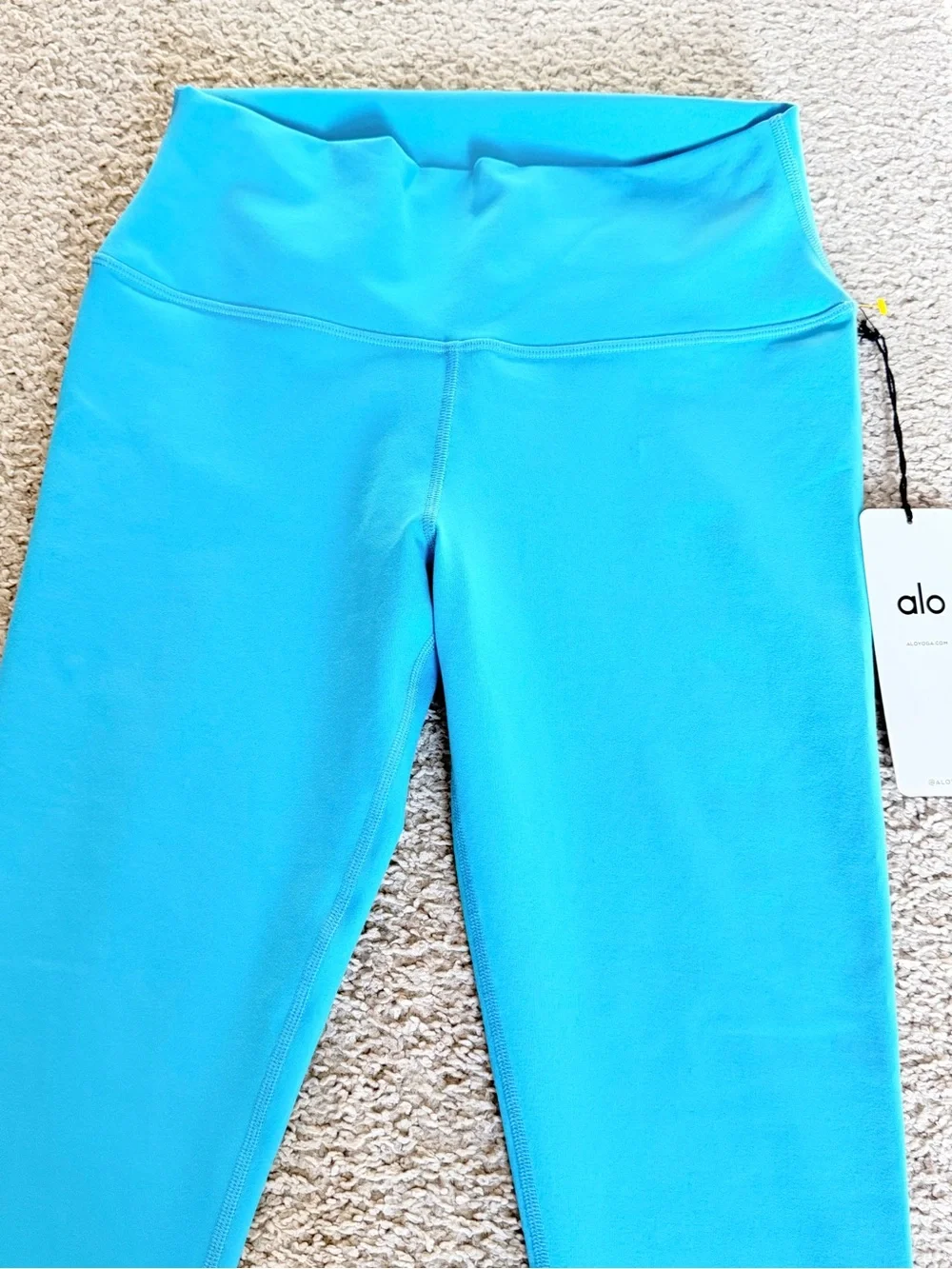 ALO Yoga woman’s Leggings in Teal Blue